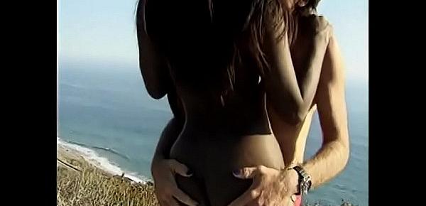  Dirty interracial couple enjoys outdoor sex near the warm sea